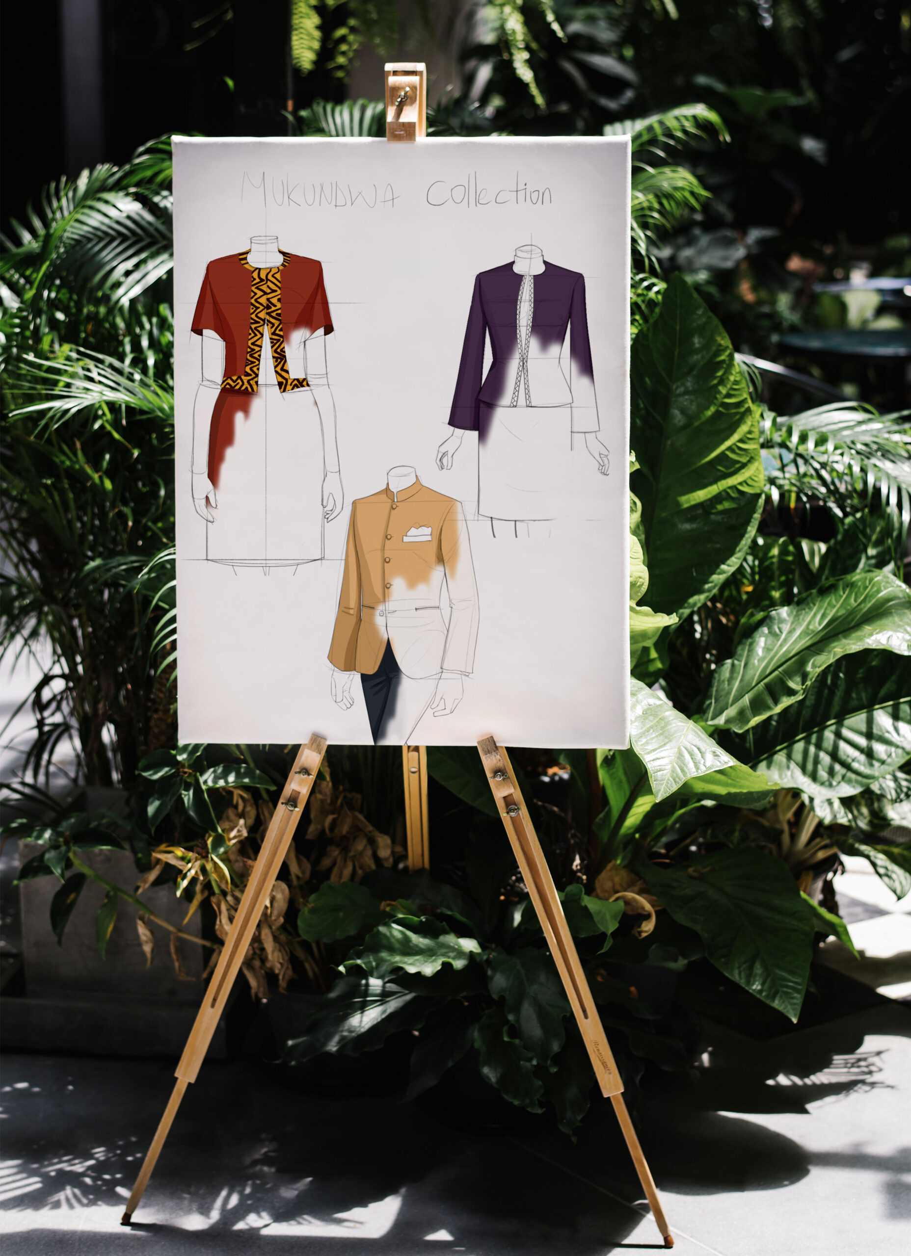 A tailor taking measurements of a client at Revolution WorkShop